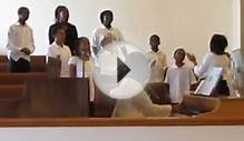 youth choir sings "Hush Somebodies calling my name"